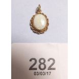 A 9ct gold opal pendant