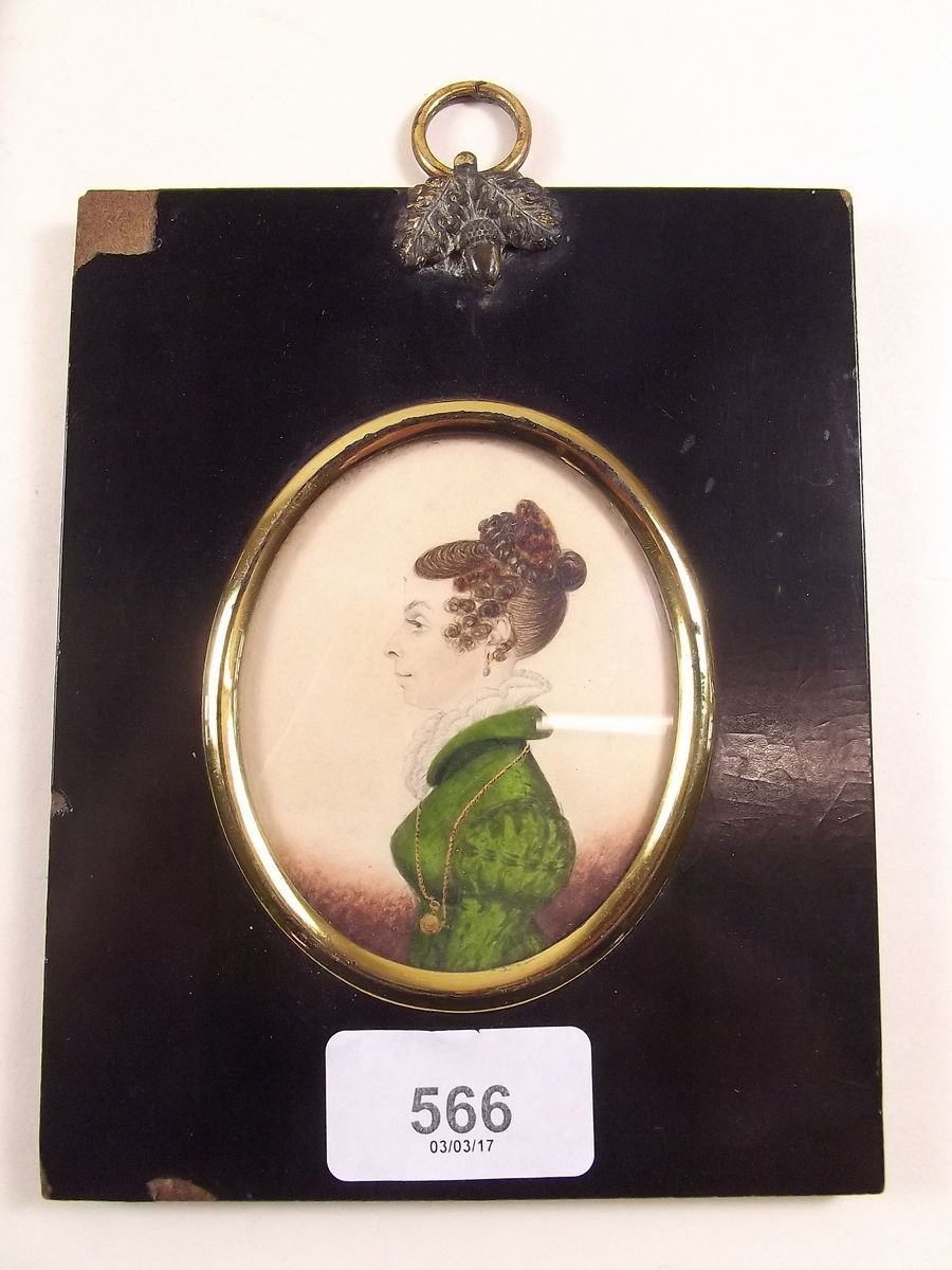 A 19th century water colour miniature portrait in ebonised frame
