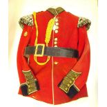 A Welsh Guards bandsman's ceremonial scarlet jacket with lanyard and belt