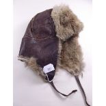 A vintage fur lined leather mountaineer/arctic hat