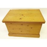 A small pine blanket chest