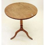 A 19th century mahogany occasional table on column and tripod support