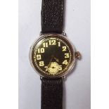 A Rolex silver military style wrist watch with black face and luminous numerals, marked Rolex to the
