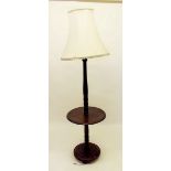 An oak standard lamp with integral occasional table