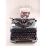 An Imperial typewriter and manual