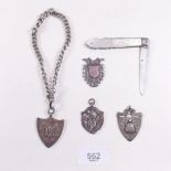 A mother of pearl and silver folding fruit knife, three silver sports medals and a silver plated