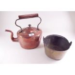 A Victorian copper kettle and a small brass preserving pan