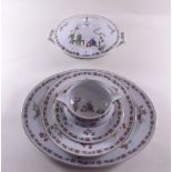 A Haviland Limoges dinner service comprising: six dinner plates, twelve bowls, covered tureen,