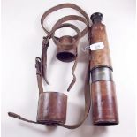 A WWI Military four draw telescope by TT & H Ltd, dated 1917 No.23387. Tel Sig. (MK IV) G.S, in