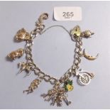 A silver charm bracelet and charms