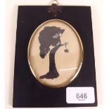 A pen and ink silhouette of a lady in ebonised frame - total size 15cm x 11cm