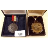 A gold plated QEII commemorative medallion - boxed and a Royal commemorative 1911 medallion for