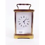 A large brass carriage clock by Matthew Norman , 14cm high