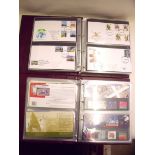 Album of GB presentation packs from 1999 Millennium issues (face £60+) together with FDC album