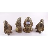 A pair of gilt plaster pineapple bookends and pair of brass penguins - 15cm