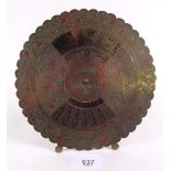A brass 100 year calendar with engraved decoration 1976-2075