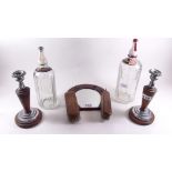 Two glass soda siphons and a pair of candlesticks and a horseshoe hall mirror with brush