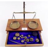 A set of balance scales and weights