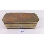 An early 19th century brass tobacco box with punched decoration