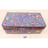 An enamel box decorated flowers on a blue ground - 17.5cm a/f