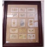 A framed and mounted set of WWI embroidered postcards - 67 x 55cm