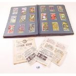 An album of cigarette cards - part sets plus ration book and food vouchers