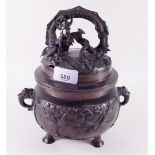 A Chinese bronze finish incense burner with bird and blossom decoration, elephant heads to shoulders