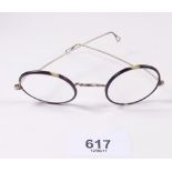 A pair of horn rimmed Victorian spectacles