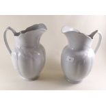 A pair of Woods white Ironstone toiletry jugs moulded wheat