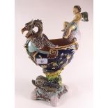 A 19th century Majolica boat form vase with cherub and eagle head by Schiller