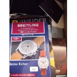 A box of various watch marketing and sales catalogues and books including Breitling and Maurice