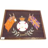 An embroidered WWI Naval panel with photograph of a woman to centre, 36 x 45cm