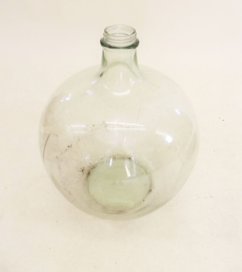 A five galleon glass carboy