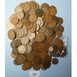 A quantity of copper/bronze coinage including: halfpennies, pennies, Edward VII through Elizabeth