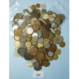 A quantity of World coins including: British silver pre 1920 and 1947, brass threepences, other