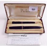 A Parker ink pen and pencil cased with paperwork