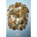 A quantity of copper/bronze farthings, halfpennies, pennies, brass threepences, sixpences,