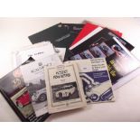 A collection of motor brochures including Morgan etc.