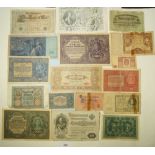 Wad of World banknotes, examples include: German marks: 100 Berlin April 1910, 1000 Berlin April