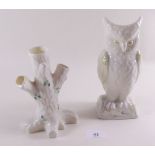 A Belleek owl form vase 21cm and a Belleek tree trunk vase