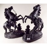 A pair of spelter Marley horses - 42cm