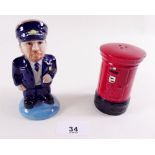 A novelty postman and letter box salt and pepper