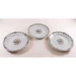 Three 19th century Faience floral painted plates - 23cm diameter