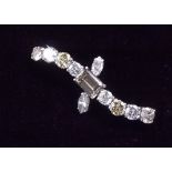 A fine diamond brooch set large champagne, yellow and cinnamon baguette, brilliant and marquise