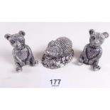 A silver filled miniature hedgehog and a silver plated teddy
