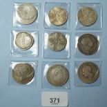 A quantity of British silver coins, 9 total including: halfcrowns/florins: George III 1817 and 1819,