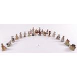 Twenty two small Wade Whimsey nursery rhyme figures including gingerbread man