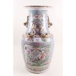 A large 19th century Chinese vase painted garden scenes and birds, 37cm tall