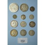 A quantity of silver content coins including: threepence, sixpences, shillings etc, plus South