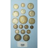 A quantity of silver content coins including: George III shilling 1787, eighteen pence 1811,